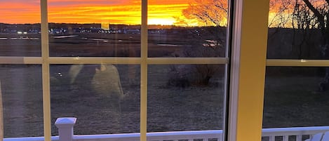 Sunset views from the living room looking out to the back deck!