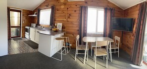 Open plan kitchen, dining and lounge, which flows onto front deck