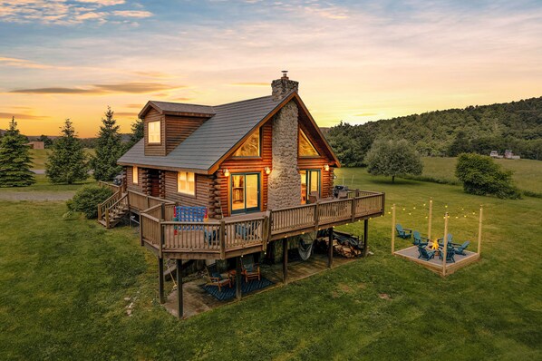 Escape to our charming log cabin, surrounded by nature.