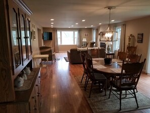 Open concept living room, dinette, and kitchen