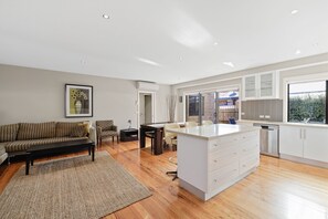 Natural light into the open plan kitchen, dining and living room