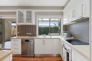 Cook up a meal with our fully equipped kitchen