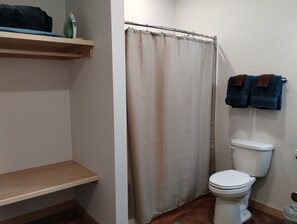 Grewingk Suite. Bathroom equipped with tub/shower combo.