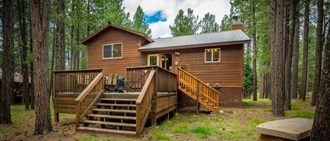 Back deck with grill and fire pit.