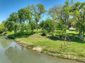 Enjoy the tranquility of the riverfront oasis.