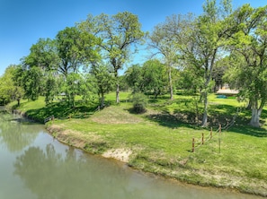 Enjoy the tranquility of the riverfront oasis.