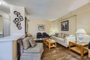 Step into modern elegance with our newly renovated home featuring stunning wood-like flooring.