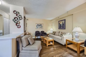 Step into modern elegance with our newly renovated home featuring stunning wood-like flooring.