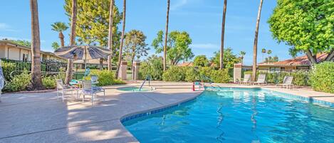 Community Pool (heated) and Spa with plenty of outdoor seating & lounging