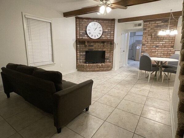 Living and Dining room with smart TV and DVD player