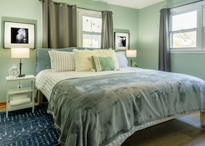 Master Bedroom – King bed, blackout curtains, and space for a crib! ✨