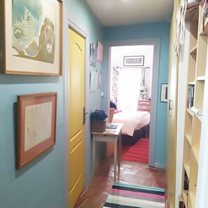 corridor to bedroom on 1st floor.bookshelves with wide collection of  books