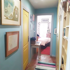 corridor to bedroom on 1st floor.bookshelves with wide collection of books