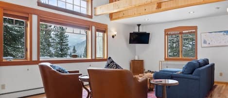 This 3-bedroom mountain home boasts an open-layout living room great for groups to spread out and relax!