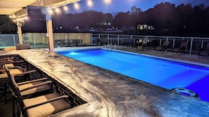 Even after the sun sets, this pool and area offers amazing views
