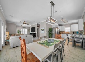 Fantastic open concept on the second floor with a 75" TV and plenty of seating for the whole group!