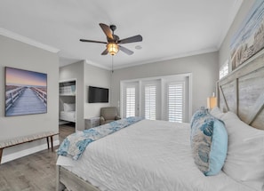 Massive Primary Suite includes peek-a-book views of the ocean, access to the 3rd floor balcony, built-in twin bunk beds and a spacious bathroom that has been totally redone!