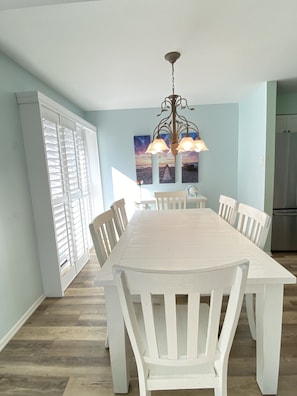 Beautiful dining room with sliding doors leading to patio. Up to 8 seats.