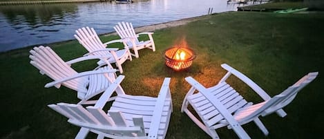 Enjoy sunset fires by the water's edge.