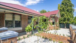 Front of the unit with front verandah looking out onto Summer Street.
