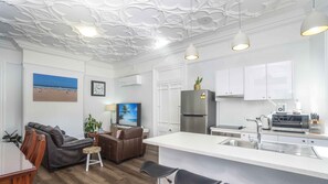 View of the kitchen, dining and living room open plan.