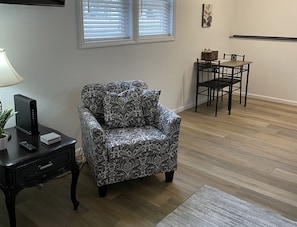 Living room looking into dining table w/2 chairs