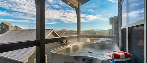Relax in the hot tub while enjoying the view!