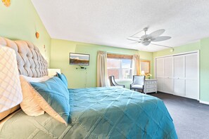 Drift into a restful sleep in this serene master bedroom with a queen bed.