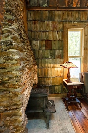 Study in textures with the 1840s rock chimney, the wall of vintage metal.
