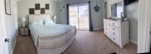 3rd Floor Master Bedroom with king sized bed overlooking beach