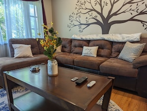 Living room place to read, watch TV or just relax on sectional w/ seating for 8.