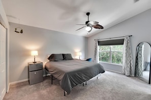 Master bedroom. View of the forest. Large mirror.