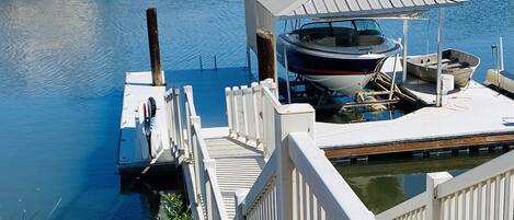 Your boat parks on the left side of dock by the paddle boards