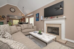 This cozy spot is perfect for relaxing or hanging out, complete with a 65" TV and PlayStation 5 for entertainment.