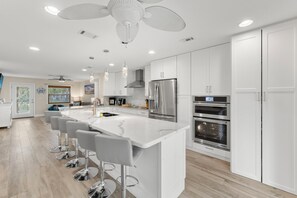 One of TWO Kitchens with Large Islands