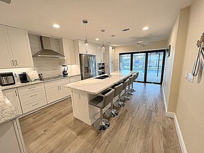 Gourmet Kitchen with Super-Sized Island Seating