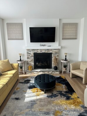 Beautifully appointed air conditioned lounge with 65 inch smart tv.