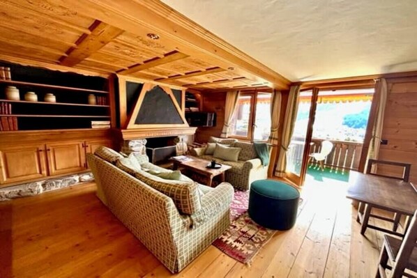 cozy living room in front of the fire place 
