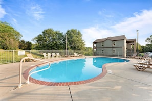 Pool right up the street from the unit.
