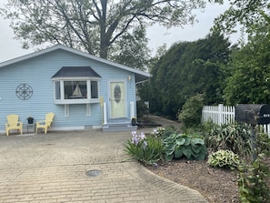 Very private, well landscaped side yard leads to a private back patio!