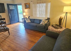 Comfortable and inviting den retreat with sofa bed