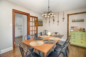 Dining area (seating for 8 with two extra chairs). Wine bar with mixer kit located on the green cabinet to mix cocktails/mocktails for your family gatherings!