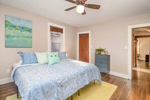 Main level king bedroom. Dresser and closet storage for clothing.