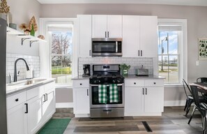 Fully stocked kitchen with cookware and all the essentials