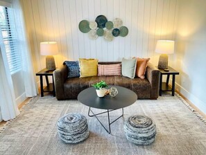 Leather sofa with lots of comfy pillows