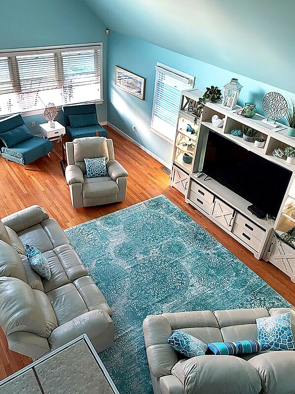 Aerial view of open living room from upstairs.