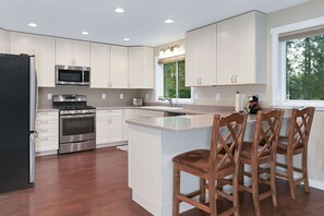 Kitchen area w/ seating for 3.