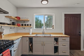 View of kitchen w/window.