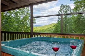 Soak in the tub with views after a long day hiking around the Smoks. 