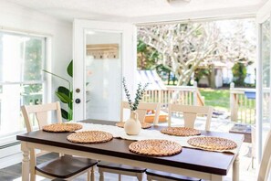 Dining room with it's beautiful skylight - overlooking the patio and garden